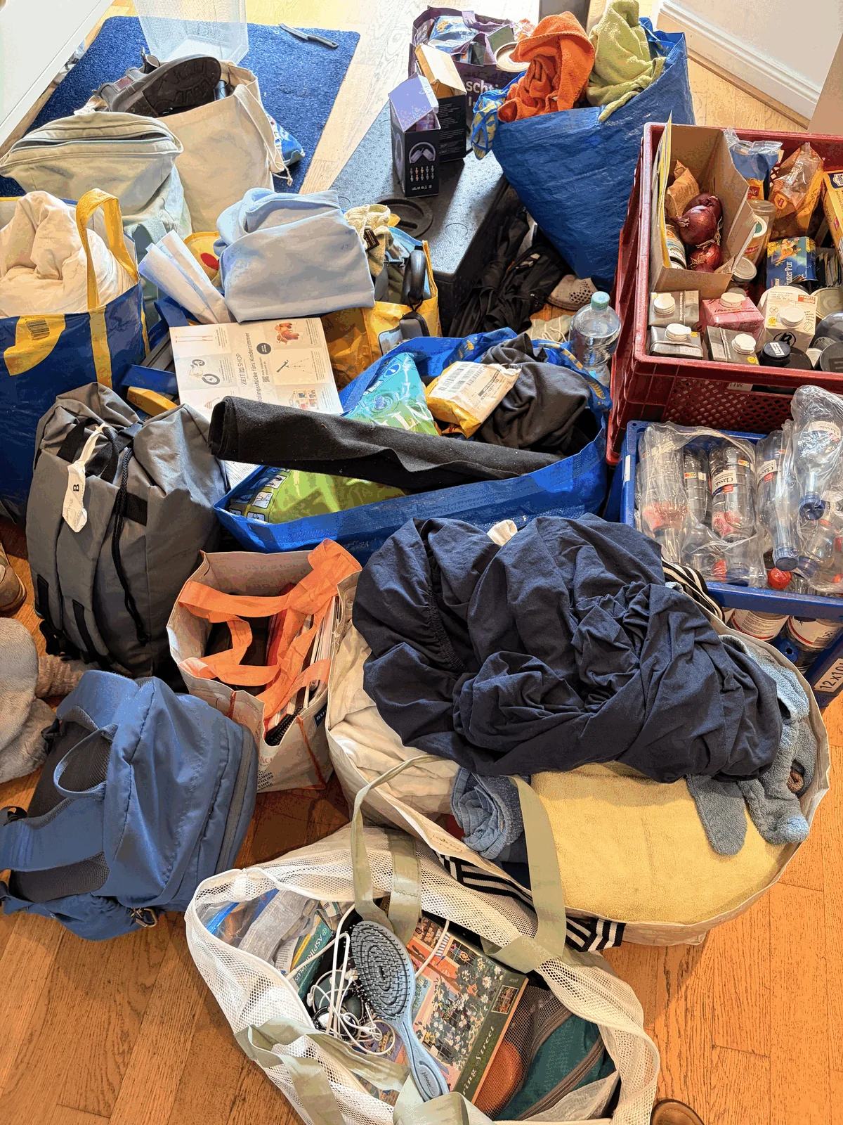 Lots of luggage on the floor